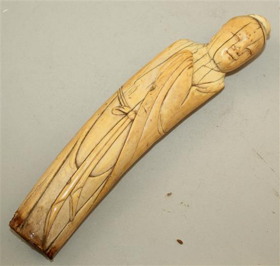 A Chinese ivory figure of a sage, late Ming dynasty, 20cm, age cracks, with stand